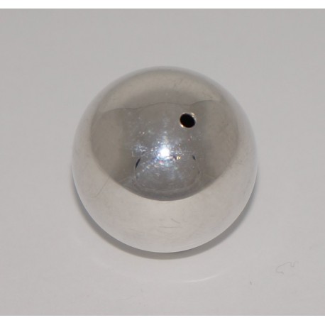 Silver ball, drilled through